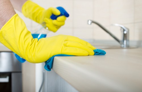 Local Richmond technician cleaning a fabric couch