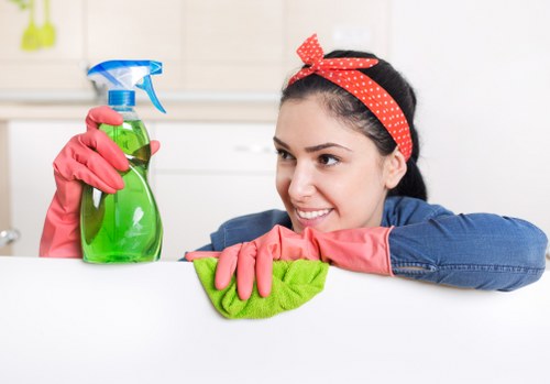 Technician performing upholstery cleaning in a Richmond commercial space